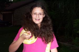 She's holding a snake image