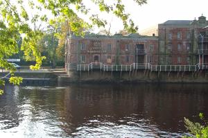 Warehouses on the river image