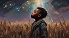Boy looking up at the stars