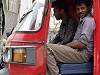 Men in an autorickshaw