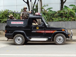 Quick reaction team monitoring protest image