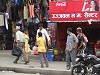 Street scene with Coca Cola sign