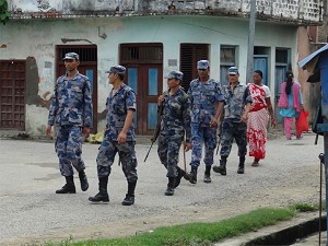 Soldiers walking down the street image